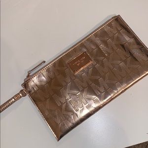 Michael kors rose gold wristlet / wallet